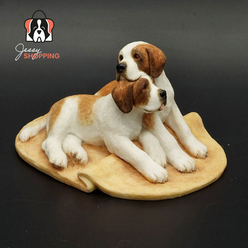 Bernhardiner-Statuenpaar auf Matte.